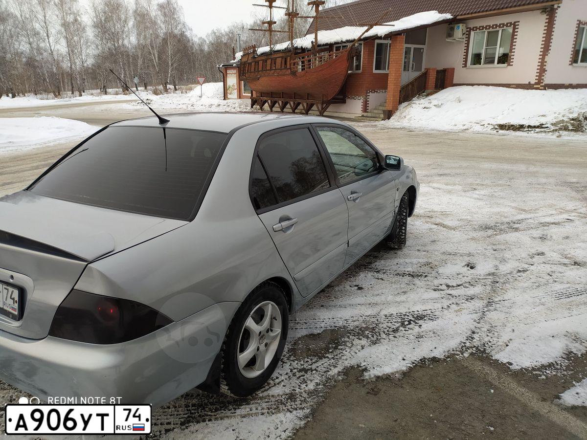 Фото автомобиля MITSUBISHI LANCER, 2006 — госномер А906УТ74. Цвет: СЕРЕБРИСТЫЙ