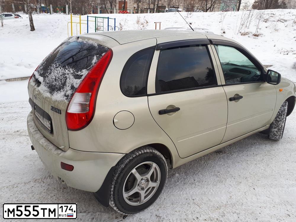 Фото автомобиля LADA 1119 KALINA, 2012 — госномер Т545СВ174. Цвет: БЕЛО-ЖЕЛТЫЙ ПЕРЛАМУТРОВЫЙ
