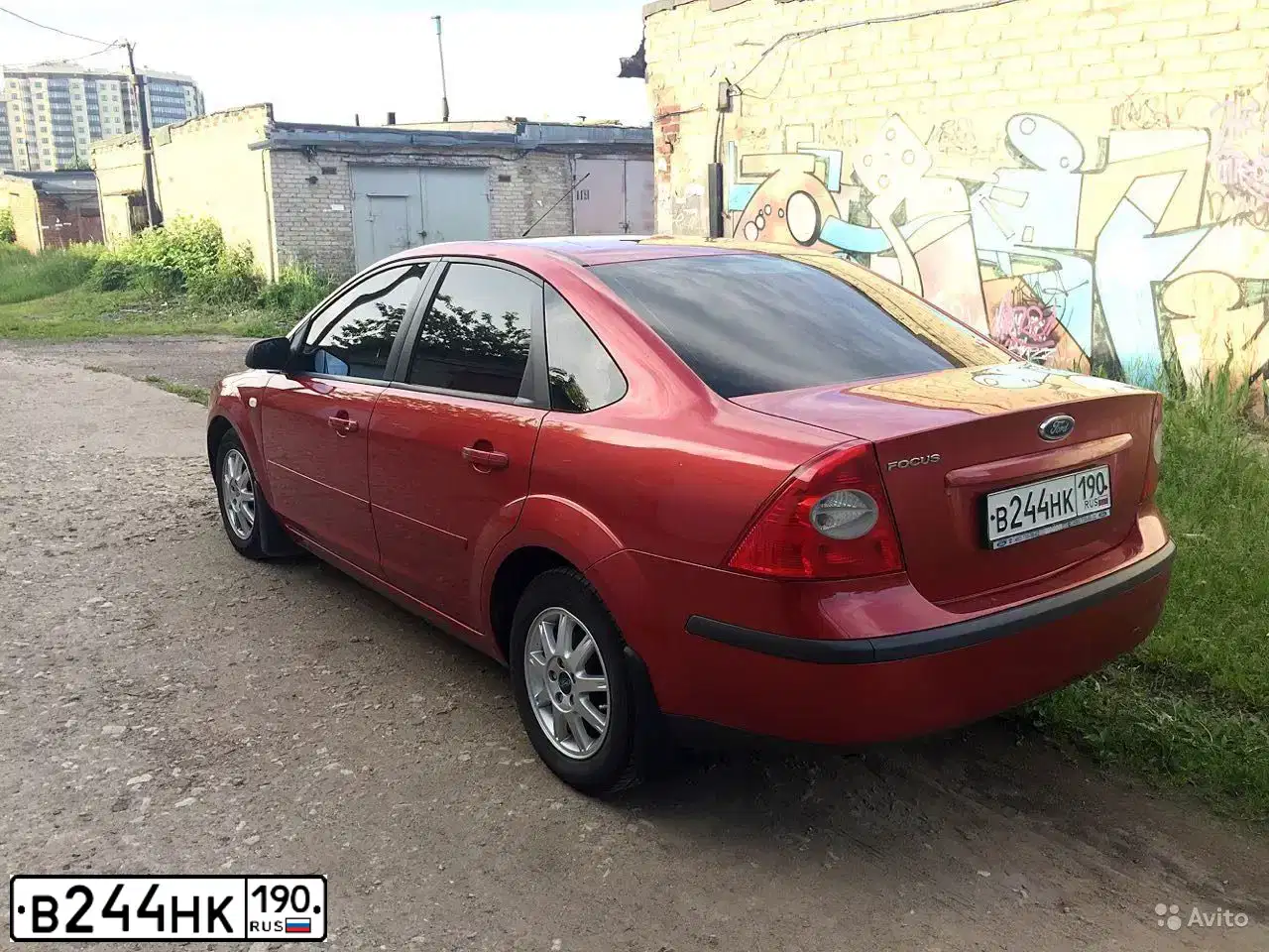 Фото автомобиля FORD FOCUS, 2006 — госномер Т684ЕН790. Цвет: Оранжевый