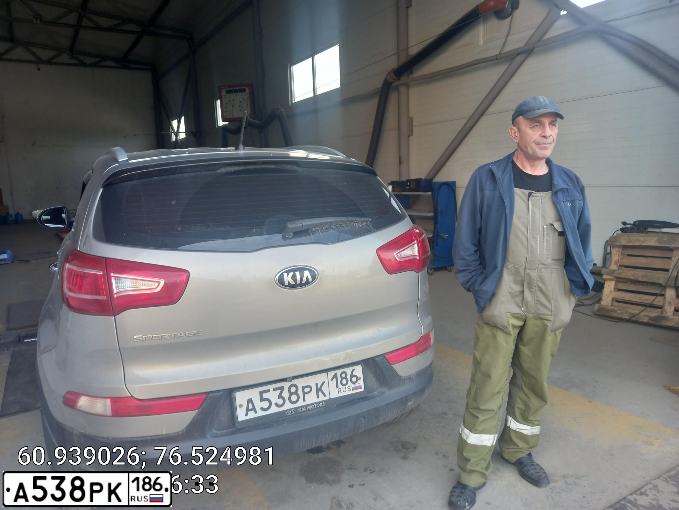 Фото автомобиля KIA SPORTAGE, 2012 — госномер М023ТК702. Цвет: серебристый