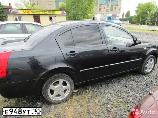 Фото автомобиля TAGAZ VORTEX ESTINA, 2009 — госномер Н004МН161. Цвет: ЧЕРНЫЙ