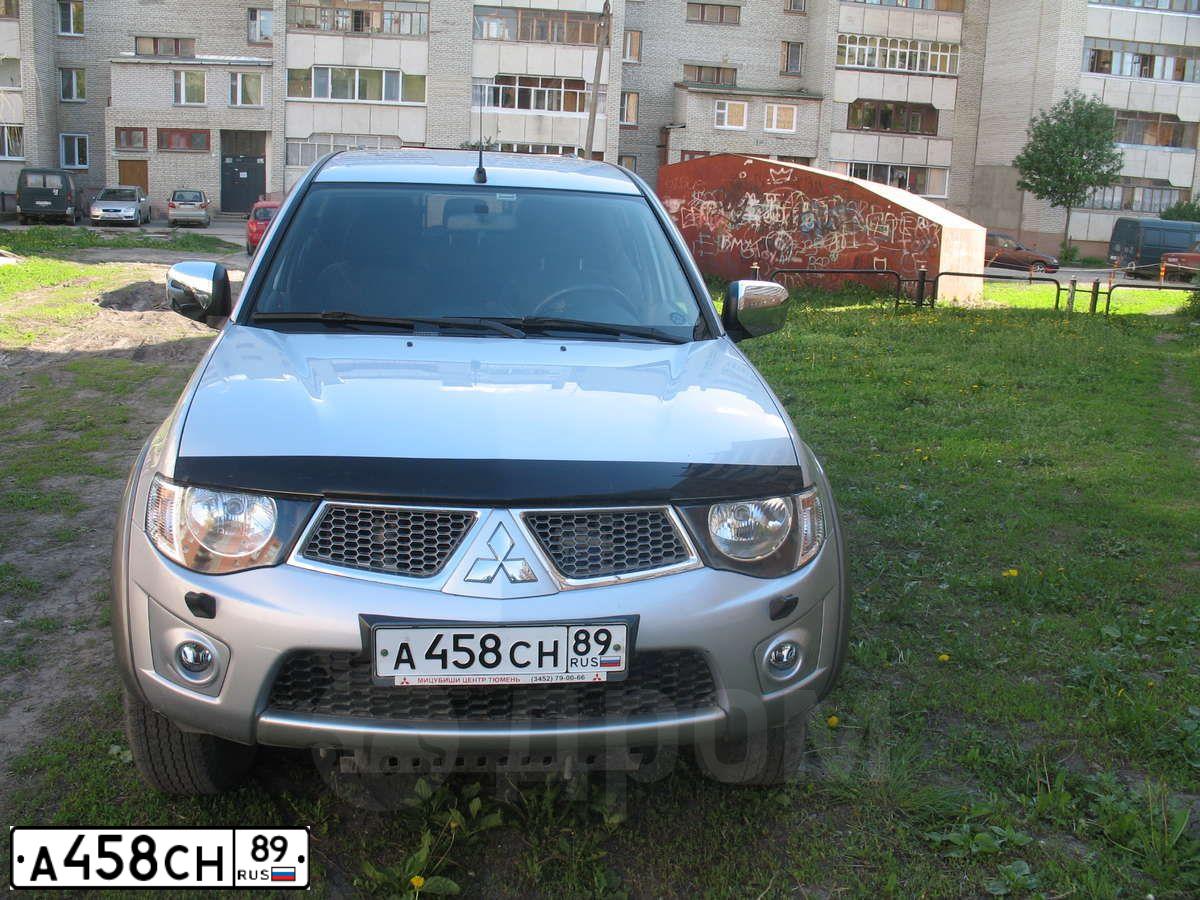 Фото автомобиля MITSUBISHI L 200, 2010 — госномер А458СН89. Цвет: СЕРЕБРИСТЫЙ