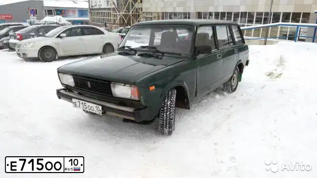 Фото автомобиля LADA 2104, 1999 — госномер Е715ОО10. Цвет: ЗЕЛЕНЫЙ