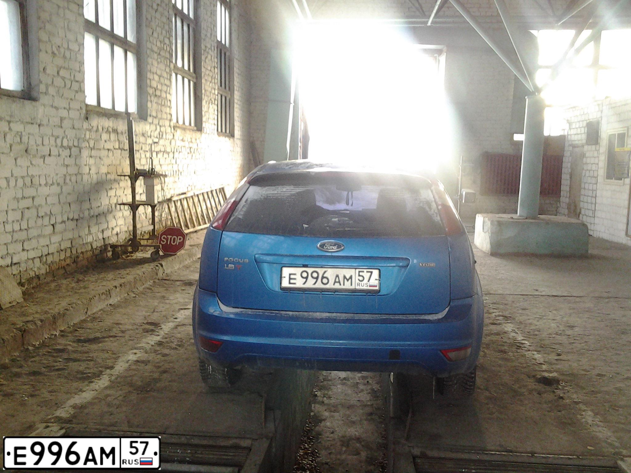 Фото автомобиля FORD FOCUS, 2007 — госномер М325МУ136. Цвет: голубой