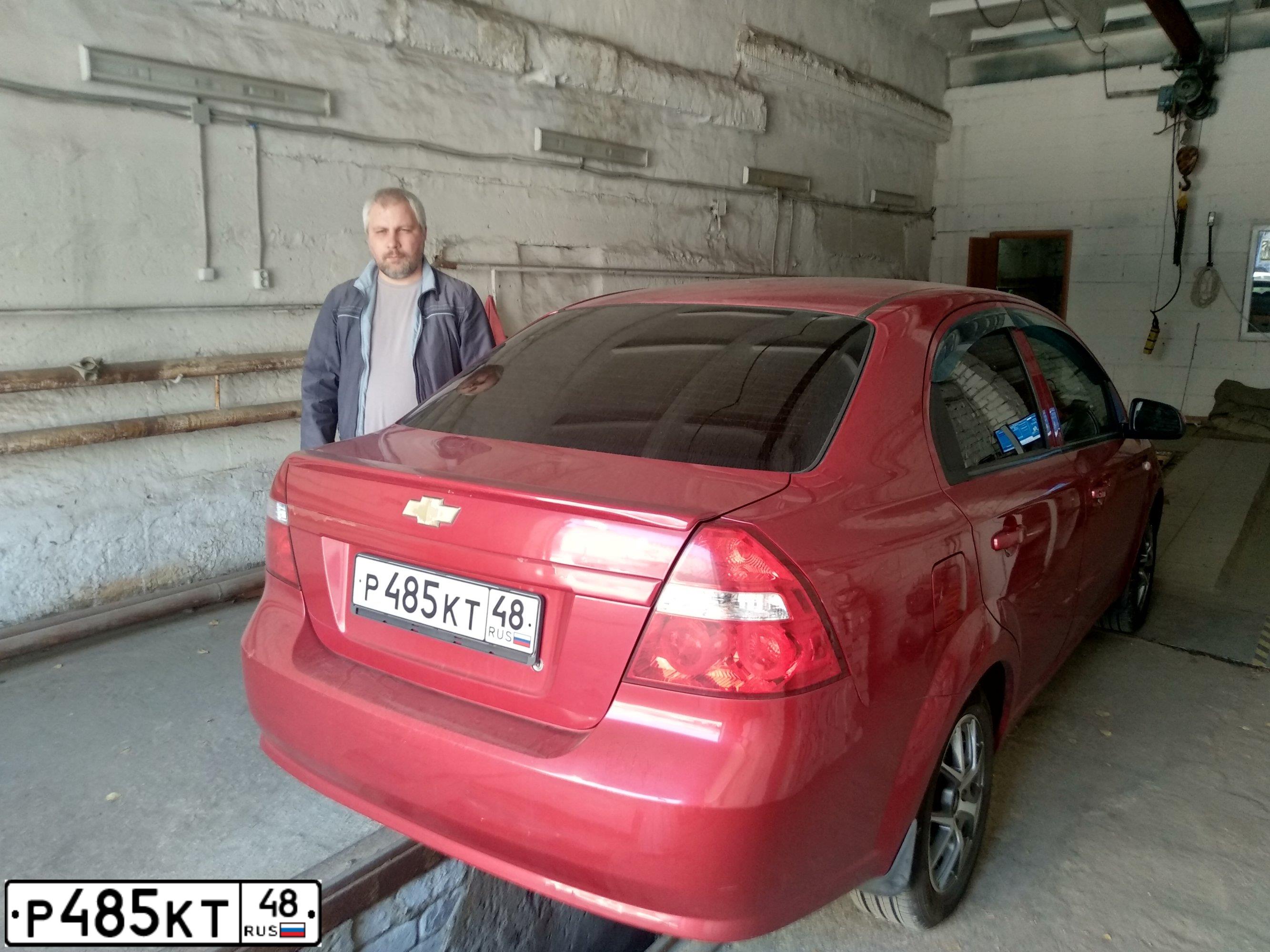 Фото автомобиля CHEVROLET AVEO, 2007 — госномер Р485КТ48. Цвет: Красный