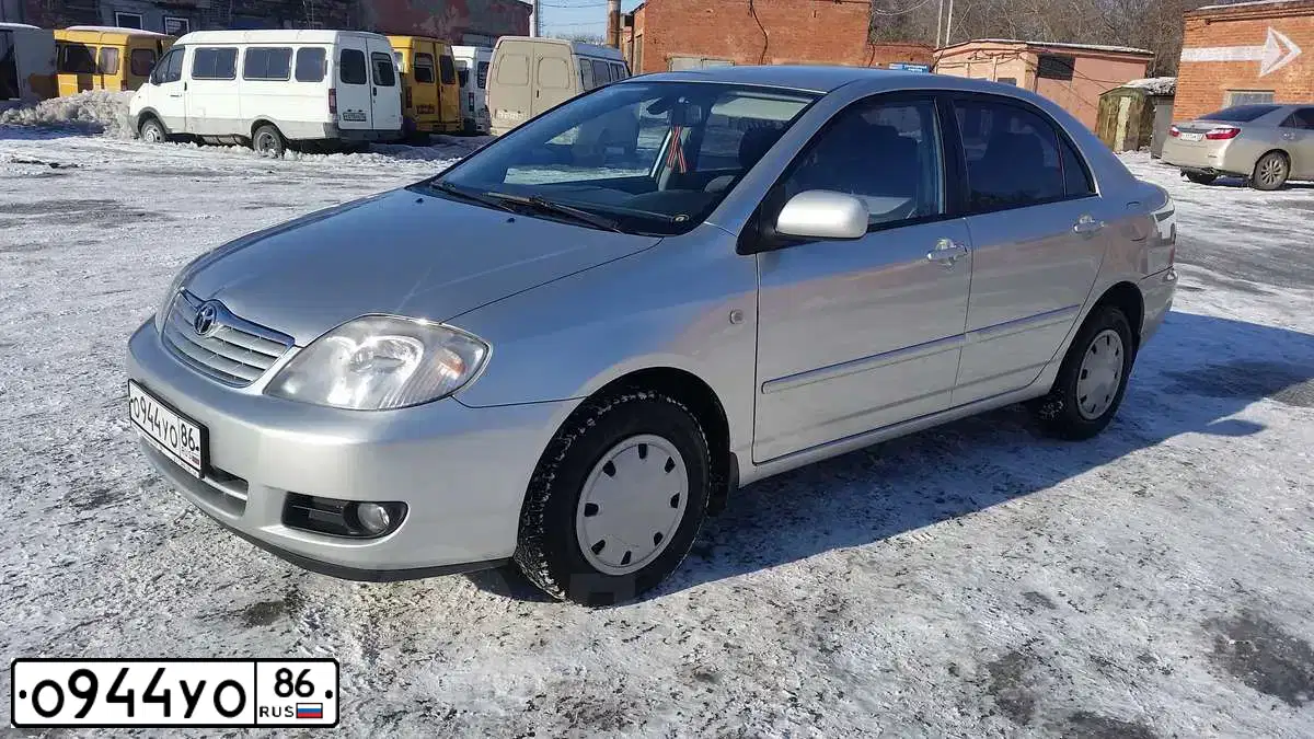 Фото автомобиля TOYOTA COROLLA, 2005 — госномер Х450ВХ55. Цвет: СЕРЕБРИСТЫЙ
