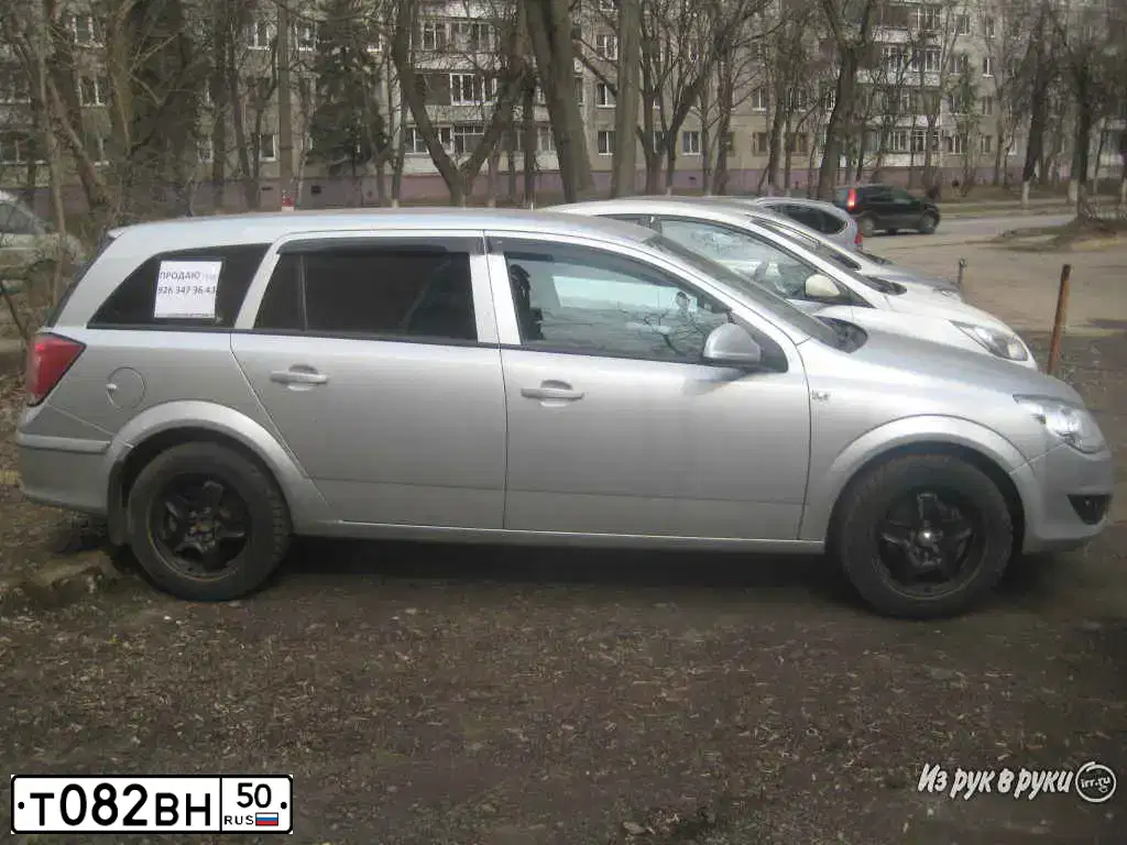 Фото автомобиля OPEL ASTRA, 2013 — госномер Е752АК156. Цвет: СЕРЕБРИСТЫЙ