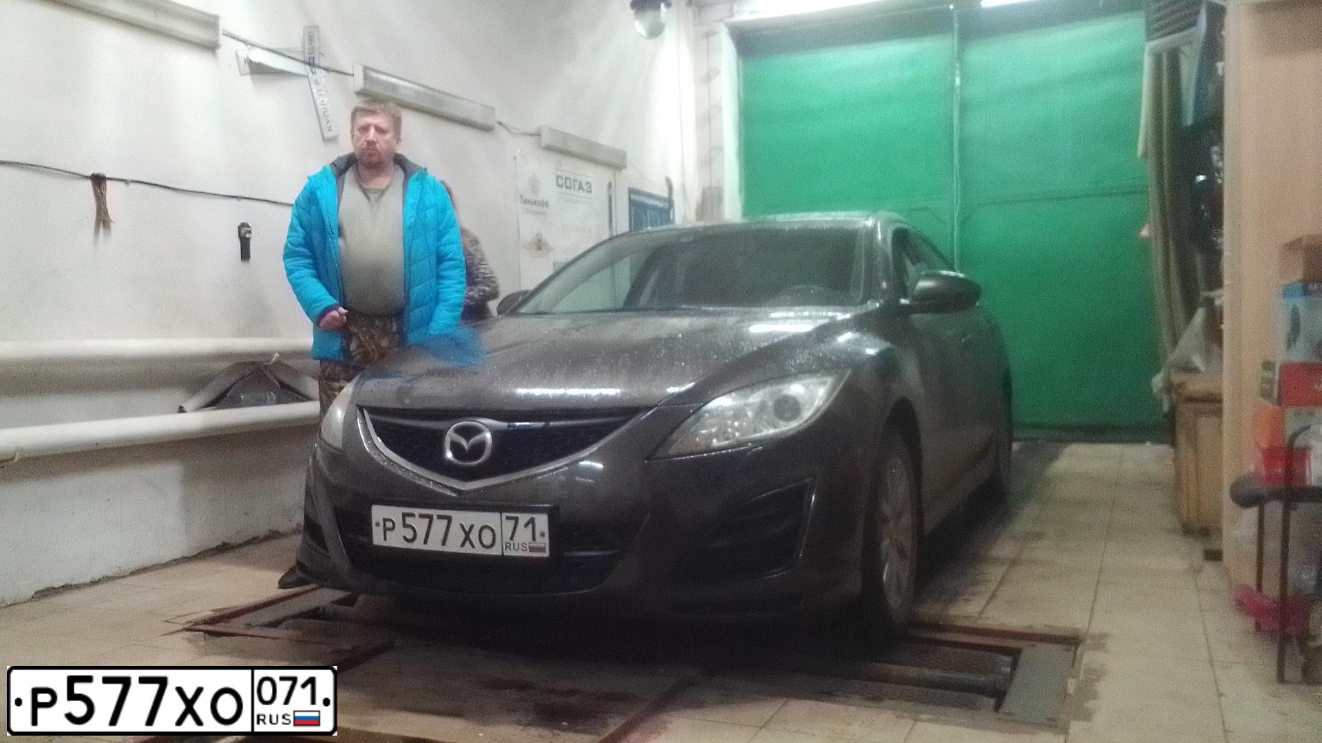 Фото автомобиля MAZDA 6, 2012 — госномер С561АС76. Цвет: Коричневый
