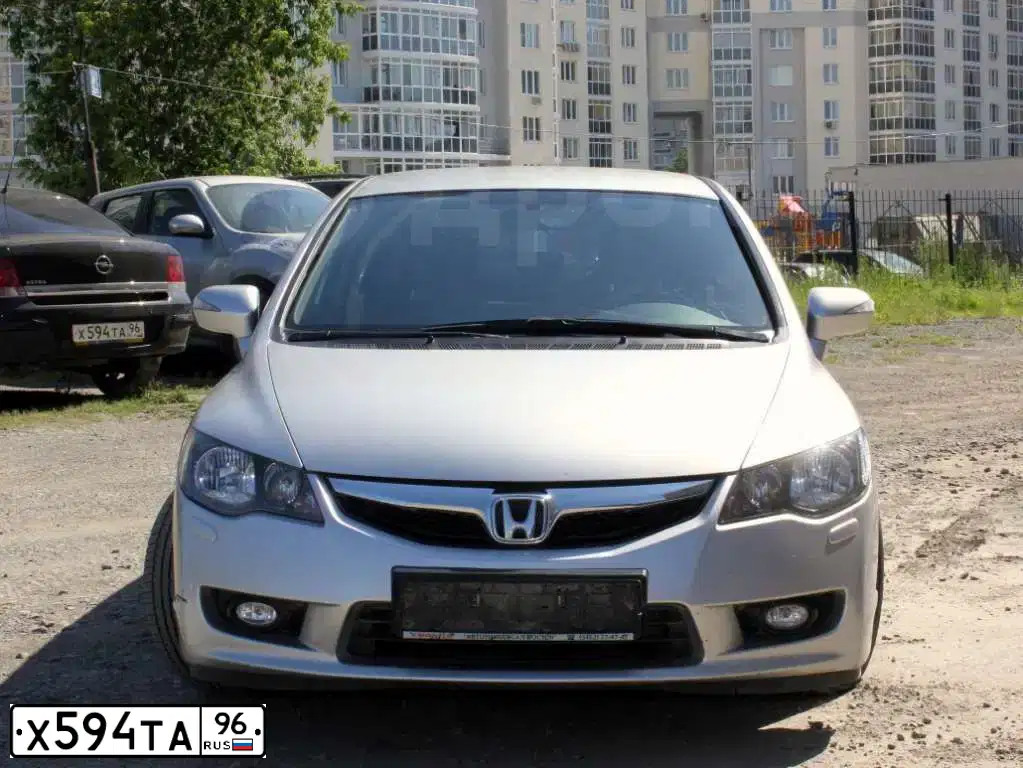 Фото автомобиля OPEL ASTRA, 2010 — госномер Х594ТА96. Цвет: ЧЕРНЫЙ