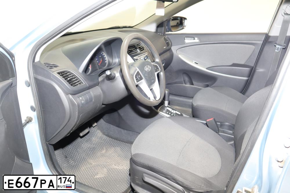 Фото автомобиля HYUNDAI SOLARIS, 2012 — госномер Е667РА174. Цвет: СЕРО-ГОЛУБОЙ
