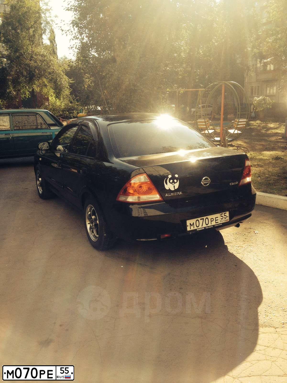 Фото автомобиля NISSAN ALMERA, 2007 — госномер М070РЕ55. Цвет: ЧЕРНЫЙ