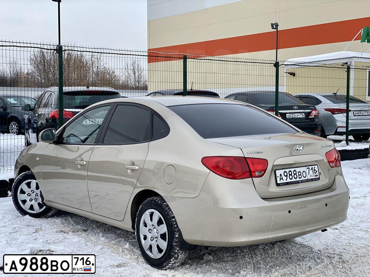 Фото автомобиля HYUNDAI I ELANTRA, 2009 — госномер М008РТ116. Цвет: ЖЕЛТО-ПЕСОЧНЫЙ