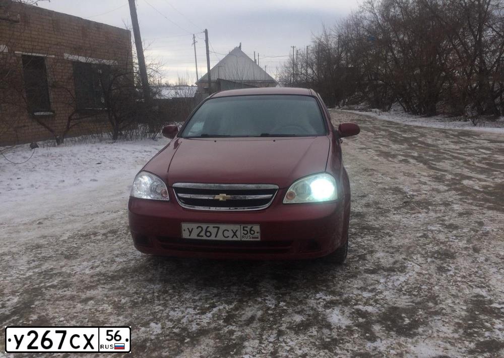 Фото автомобиля CHEVROLET LACETTI, 2008 — госномер Т507ЕС56. Цвет: Красный