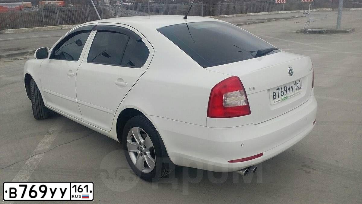 Фото автомобиля SKODA OCTAVIA, 2010 — госномер В769УУ161. Цвет: Белый