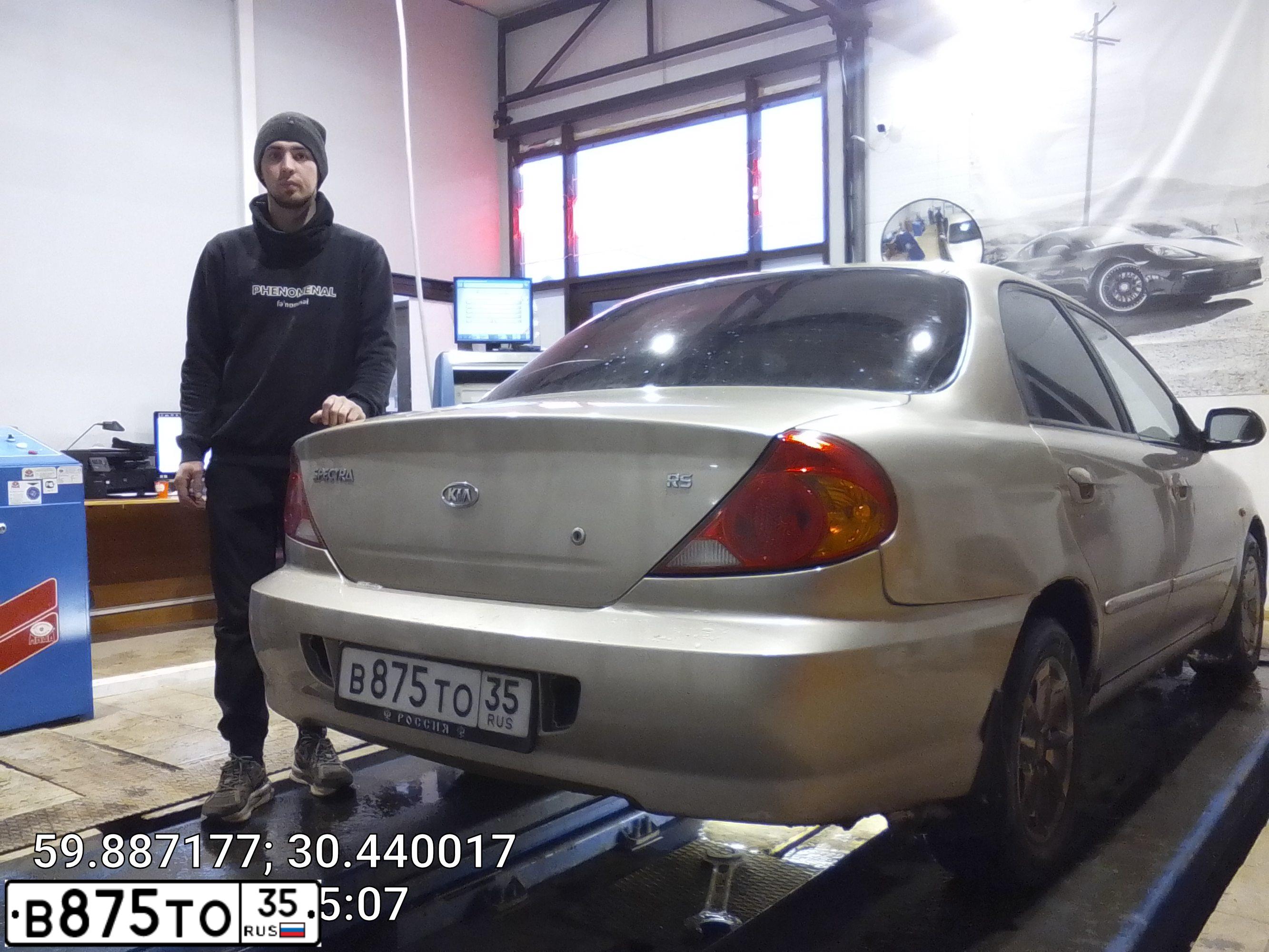 Фото автомобиля KIA SPECTRA, 2008 — госномер В875ТО35. Цвет: Золотисто-бежевый