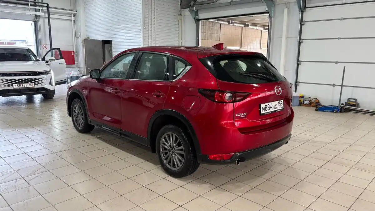 Фото автомобиля EXEED RX, 2023 — госномер Р553УУ159. Цвет: Белый