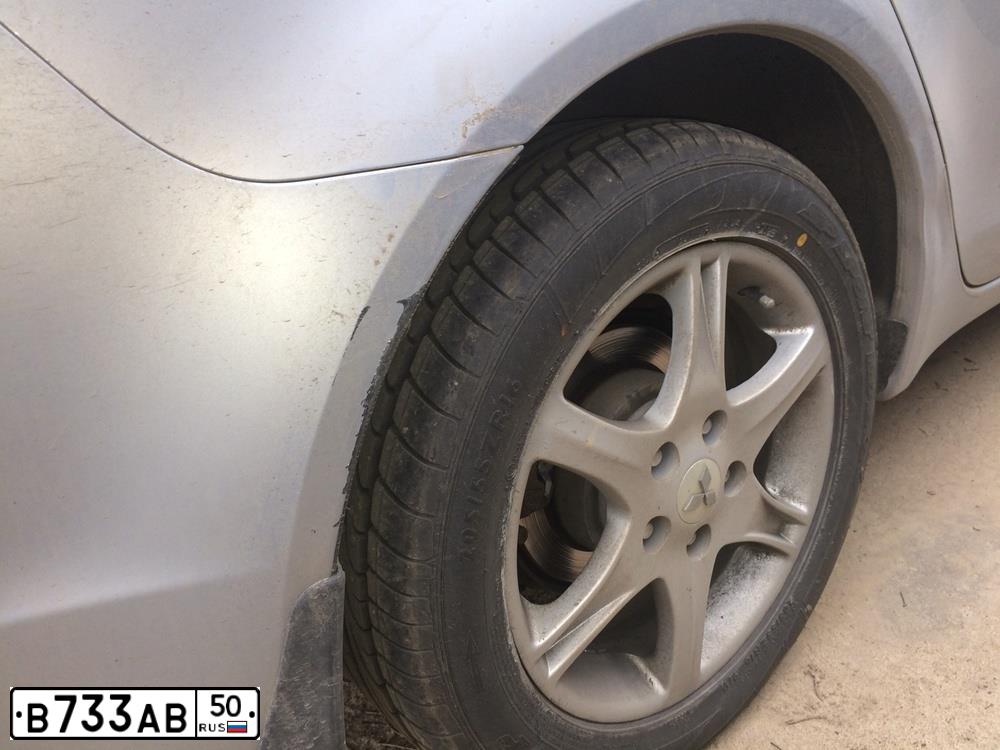 Фото автомобиля MITSUBISHI LANCER, 2008 — госномер М960МУ154. Цвет: Серебристый