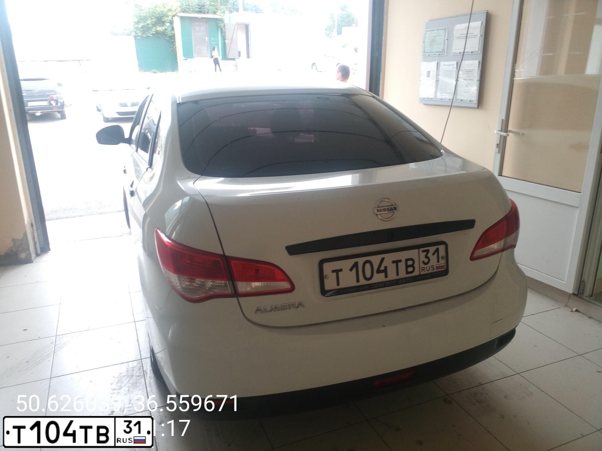 Фото автомобиля NISSAN ALMERA /AVTOVAZ/, 2014 — госномер Т104ТВ31. Цвет: Белый