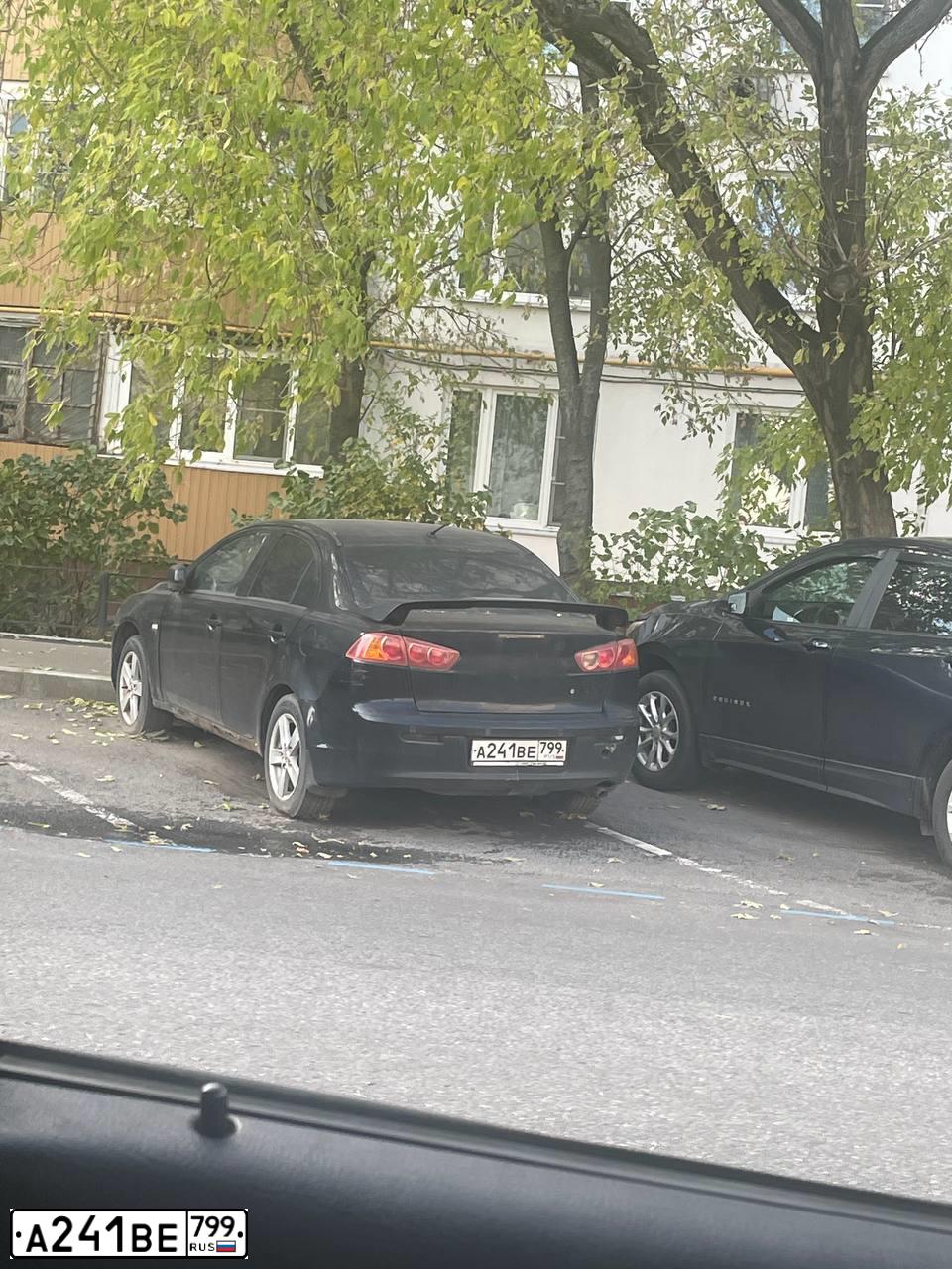 Фото автомобиля MITSUBISHI LANCER, 2007 — госномер А241ВЕ799. Цвет: ЧЕРНЫЙ