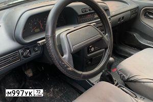 Фото автомобиля LADA 2115 SAMARA, 2010 — госномер М997УК72. Цвет: Сине-Черный