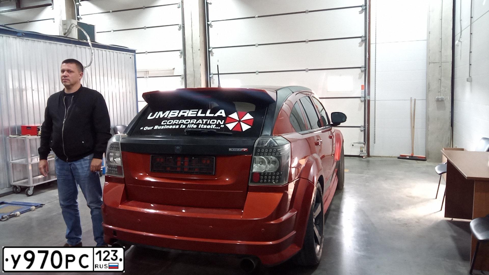 Фото автомобиля DODGE CALIBER, 2008 — госномер С230ТК05. Цвет: Оранжевый