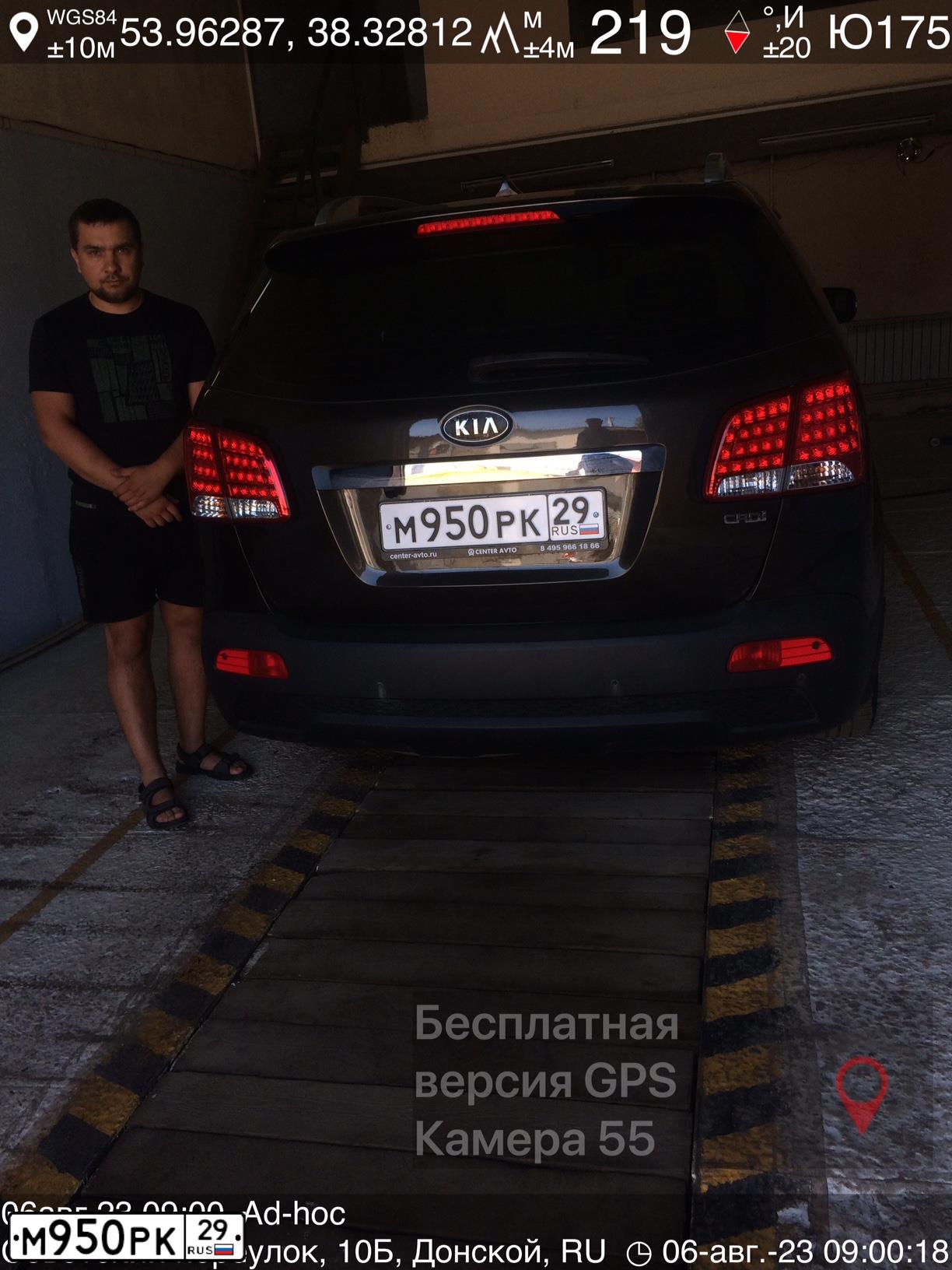 Фото автомобиля KIA SORENTO, 2010 — госномер М950РК29. Цвет: Коричневый
