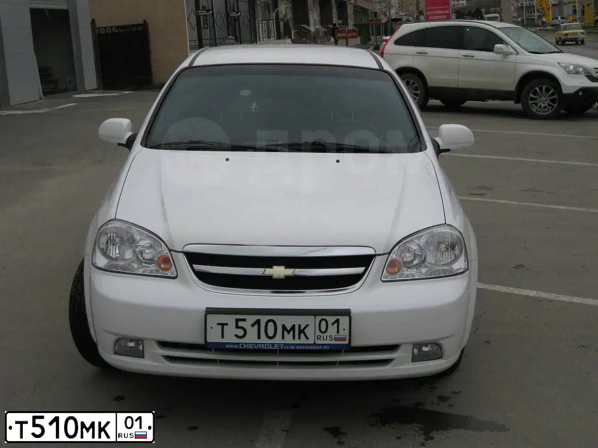 Фото автомобиля CHEVROLET LACETTI, 2008 — госномер С213КТ123. Цвет: БЕЛЫЙ