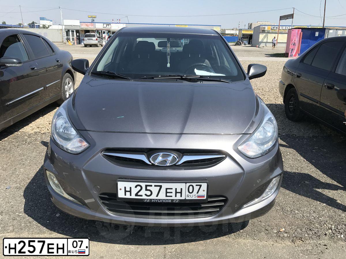 Фото автомобиля HYUNDAI SOLARIS, 2013 — госномер К087ХР161. Цвет: ЧЕРНО-СЕРЫЙ