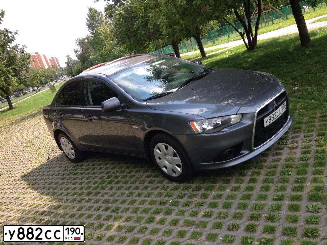 Фото автомобиля MITSUBISHI LANCER, 2011 — госномер Е548СВ73. Цвет: СЕРЫЙ