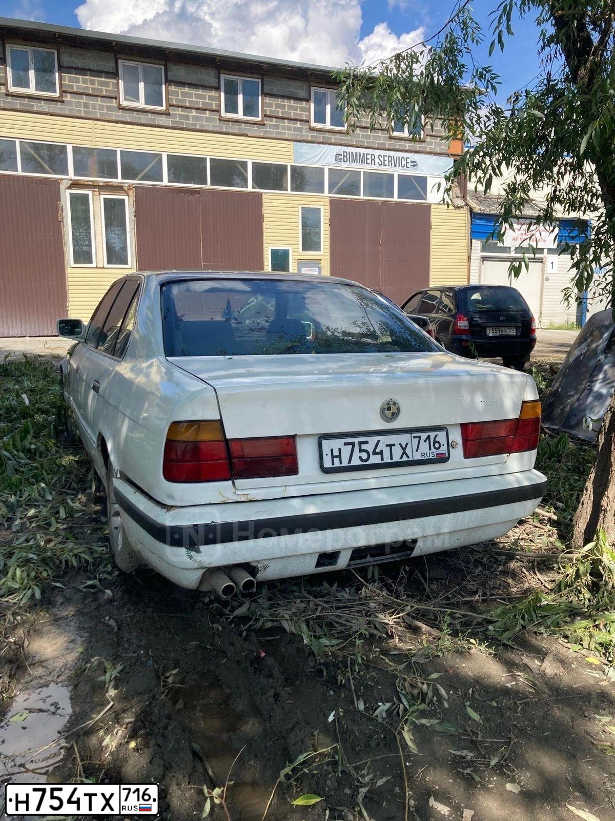 Фото автомобиля BMW SERIE 5, 1992 — госномер Н754ТХ716. Цвет: Белый