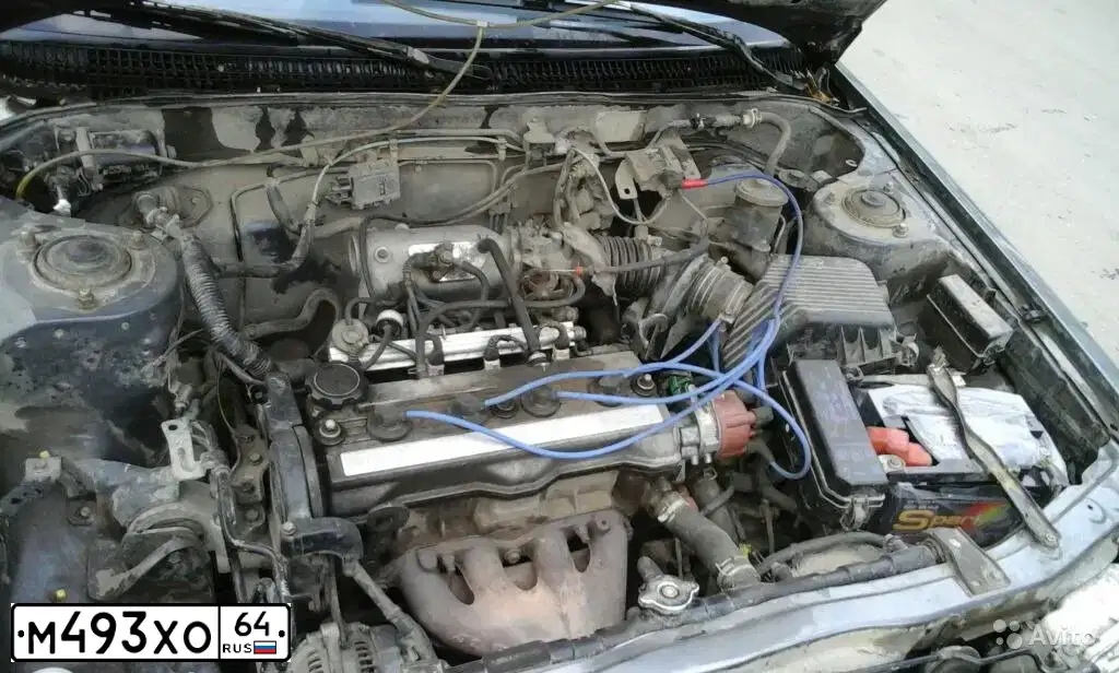 Фото автомобиля TOYOTA CARINA, 1988 — госномер Е483РА64. Цвет: ТЕМНО-СЕРЫЙ