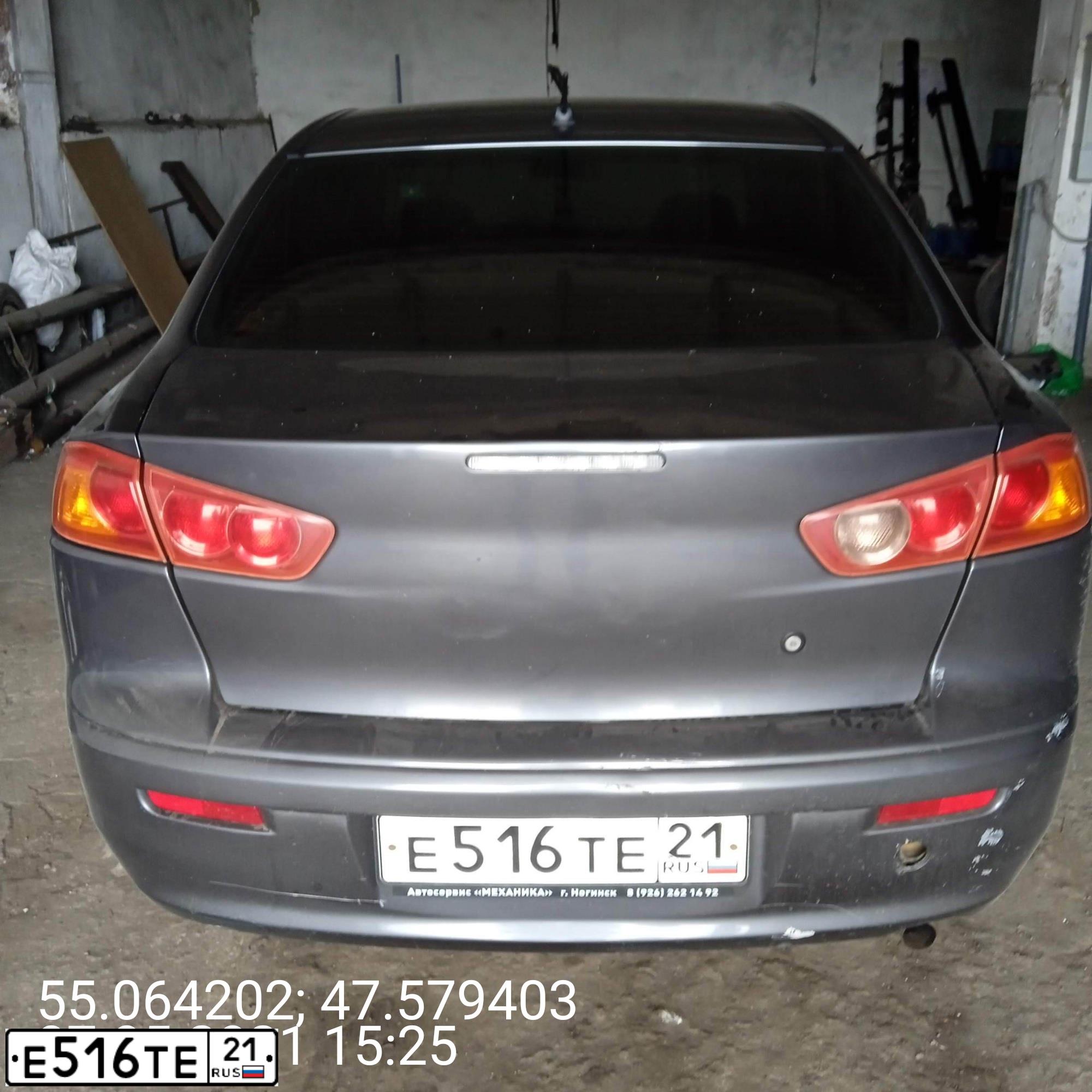 Фото автомобиля MITSUBISHI LANCER, 2008 — госномер Е516ТЕ21. Цвет: СЕРЫЙ