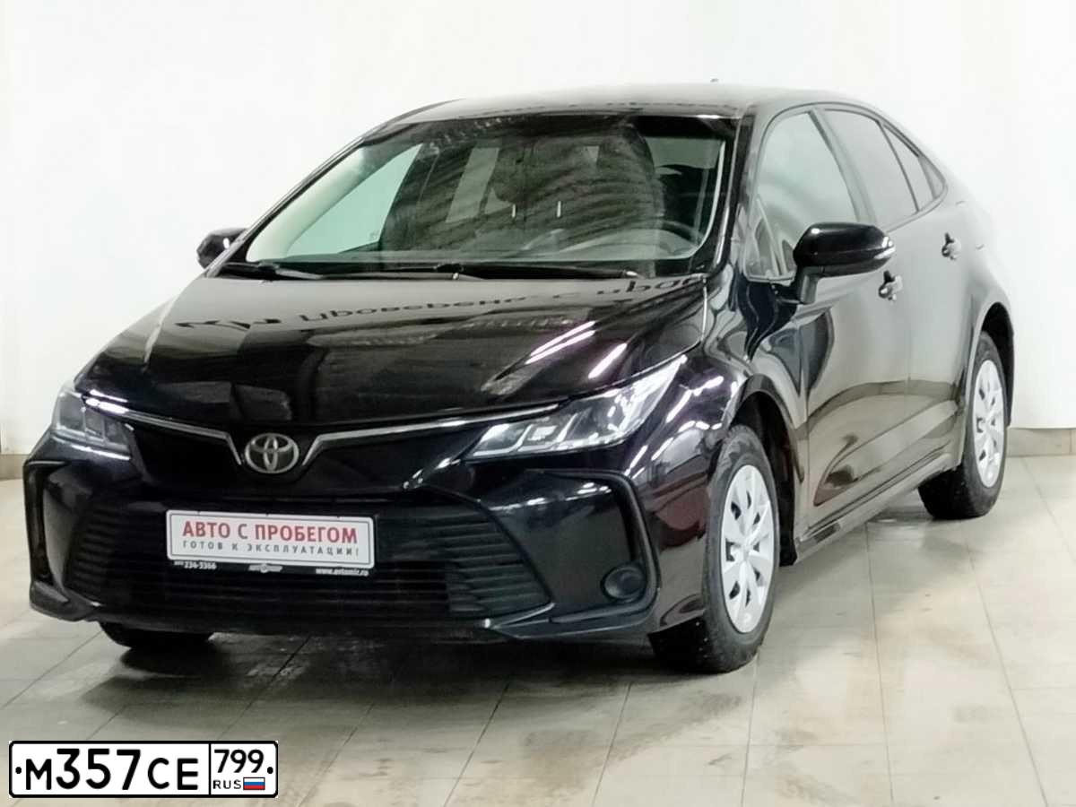 Фото автомобиля TOYOTA COROLLA, 2019 — госномер К313АС977. Цвет: ЧЕРНЫЙ