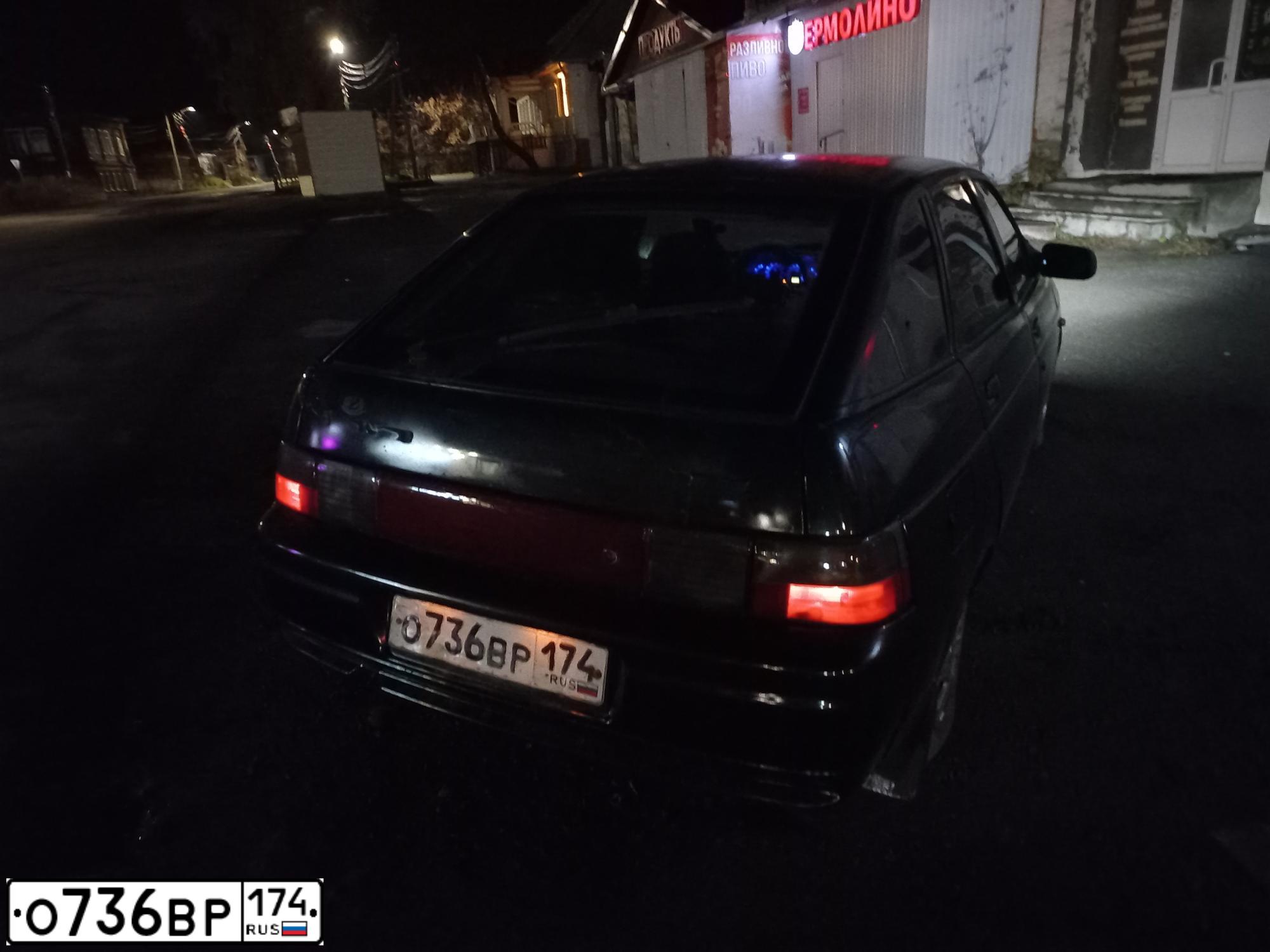 Фото автомобиля LADA 2112, 2006 — госномер О736ВР174. Цвет: ЧЕРНЫЙ