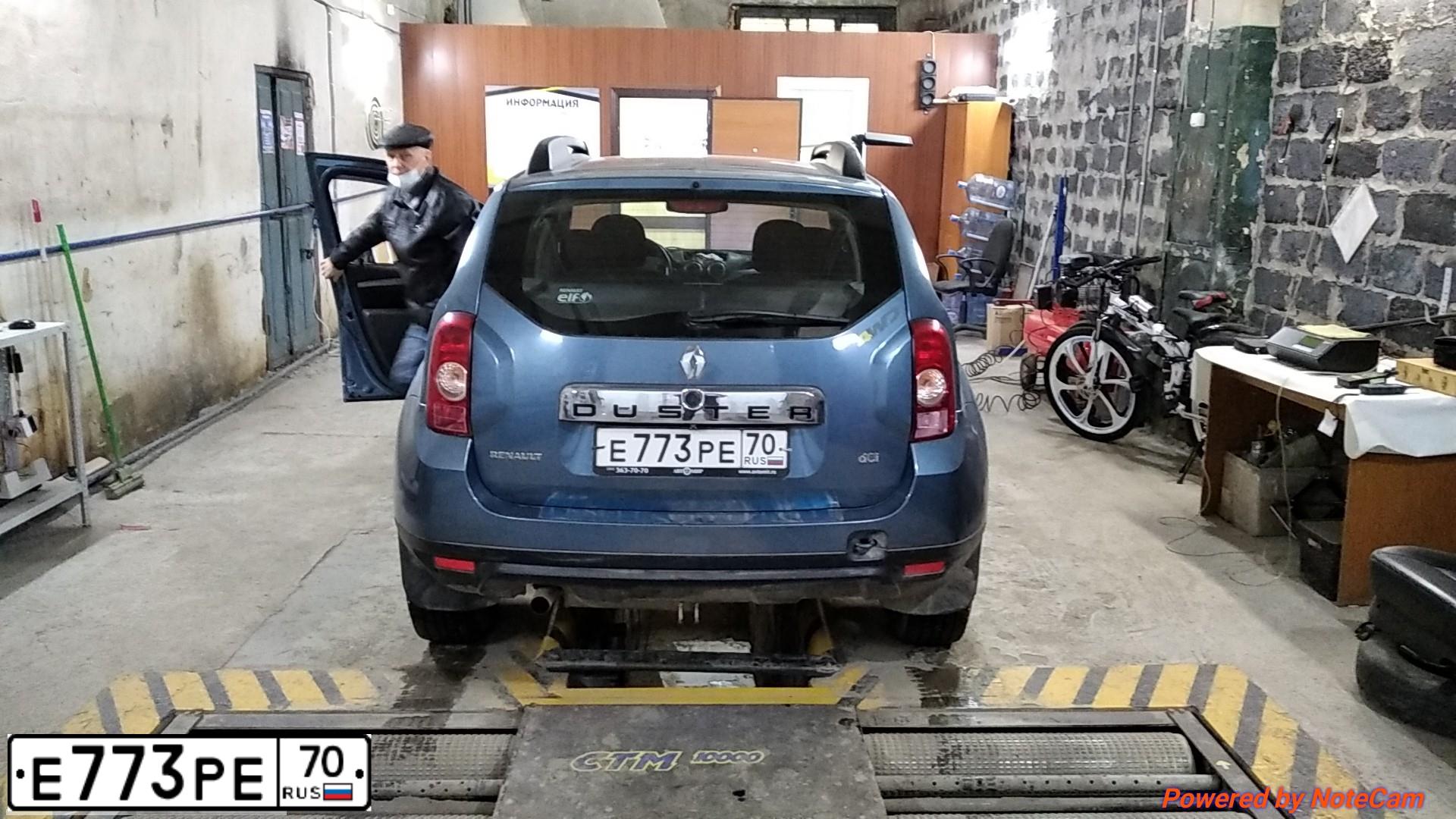 Фото автомобиля RENAULT DUSTER, 2012 — госномер Е773РЕ70. Цвет: синий