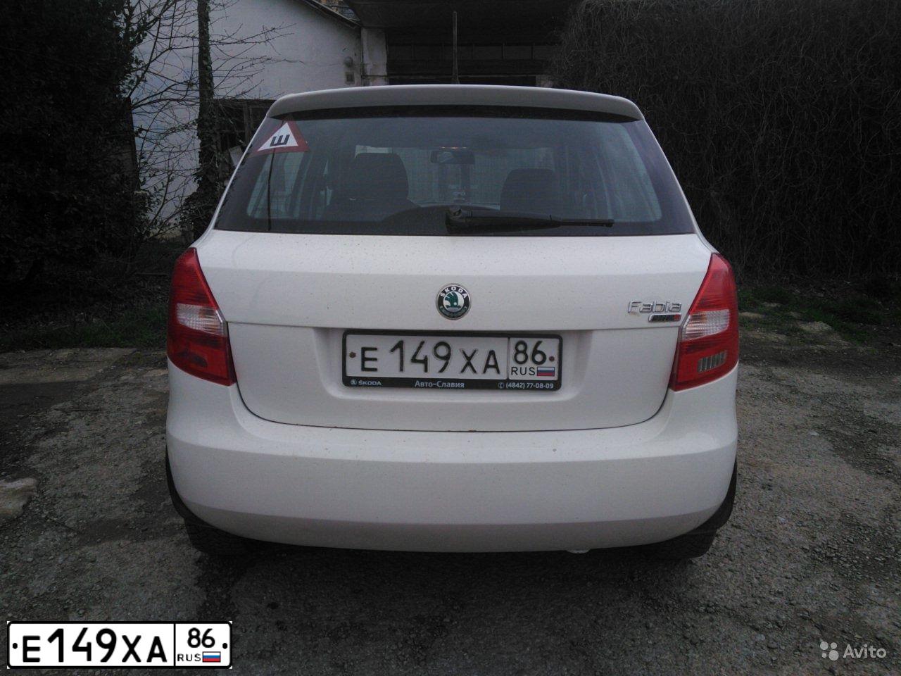 Фото автомобиля SKODA FABIA, 2011 — госномер К484ТК82. Цвет: Белый