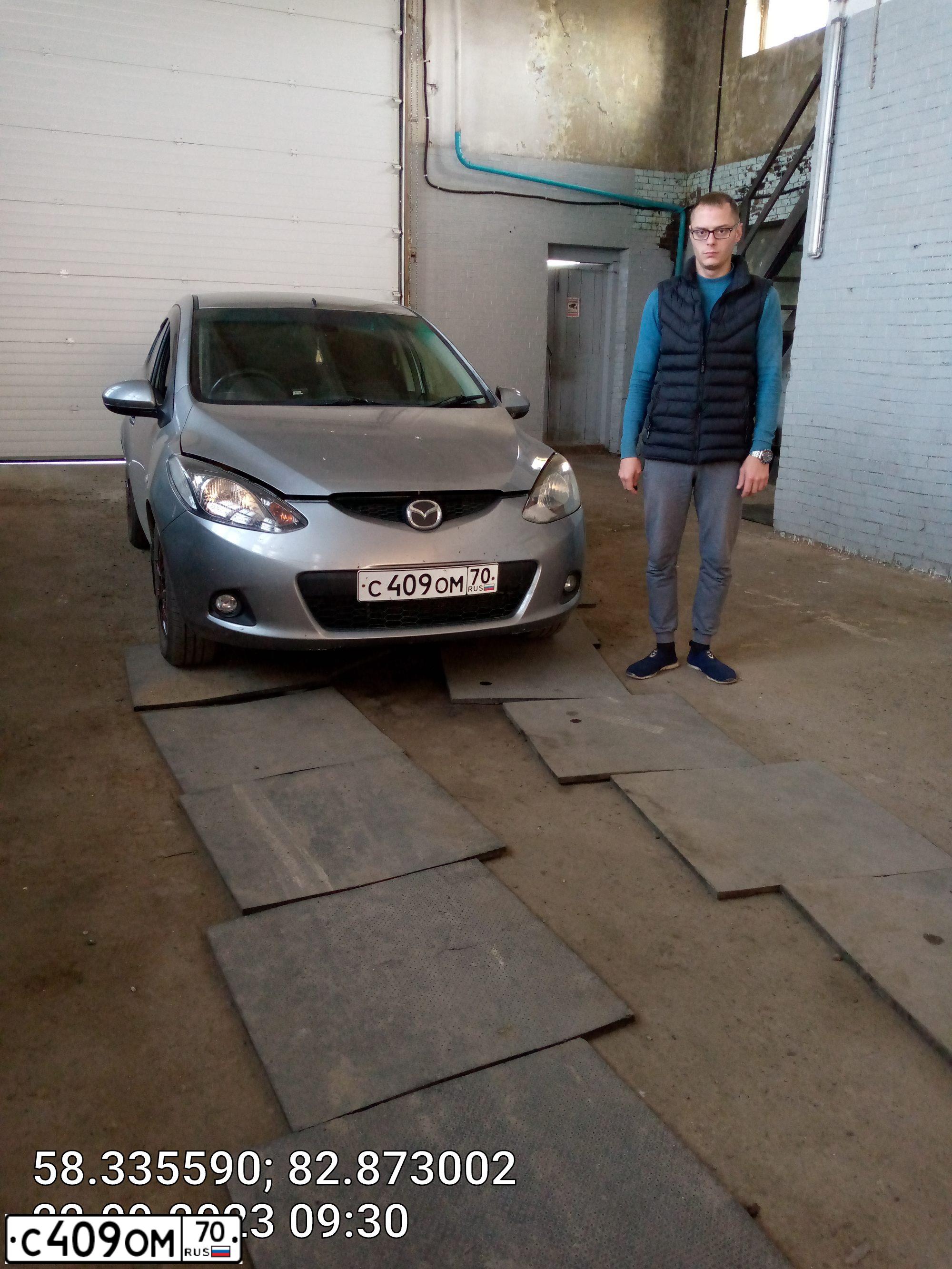 Фото автомобиля MAZDA DEMIO, 2010 — госномер Н144ВК70