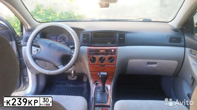 Фото автомобиля TOYOTA COROLLA, 2002 — госномер К239КР30. Цвет: СЕРЕБРИСТЫЙ