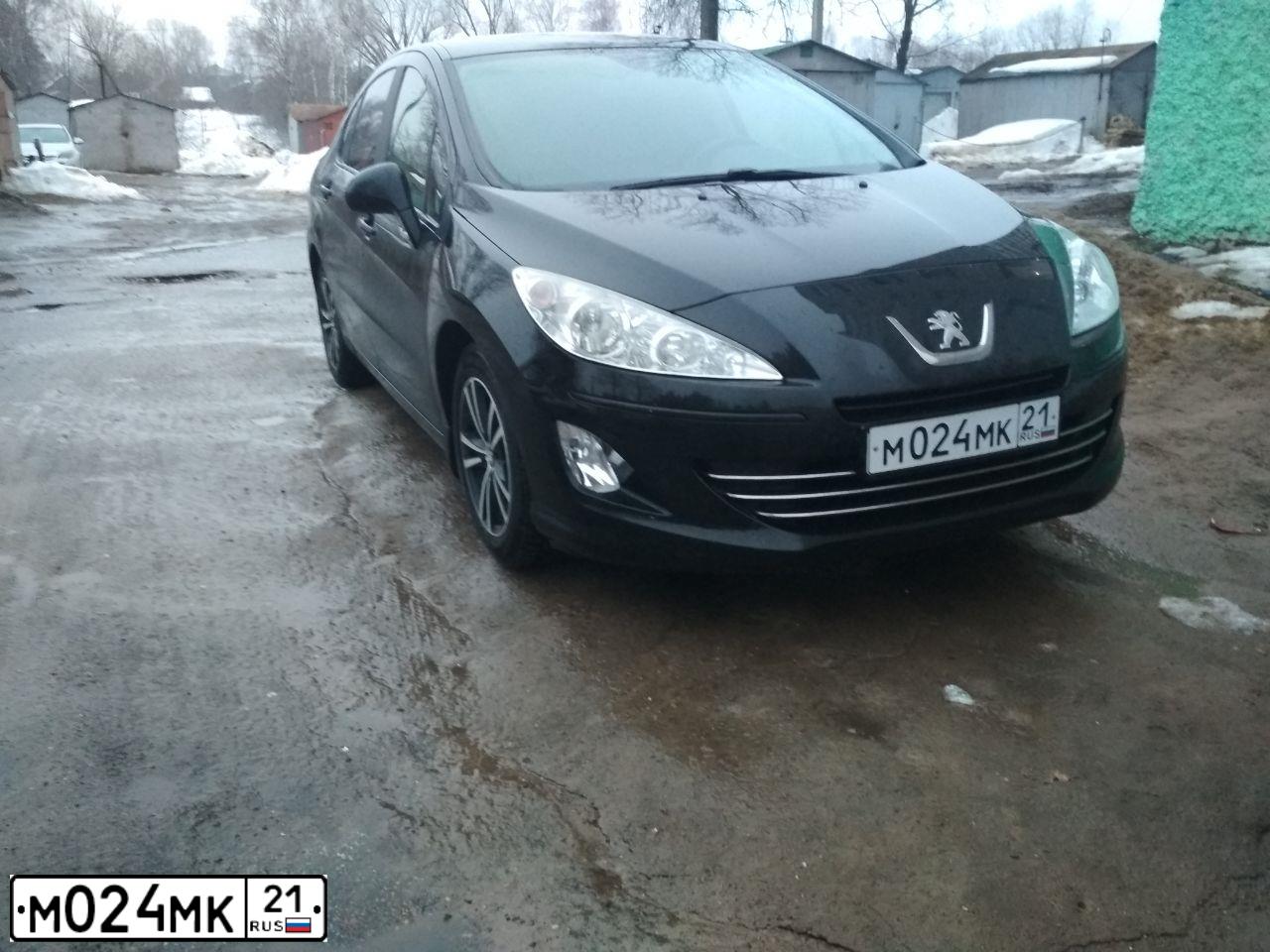 Фото автомобиля PEUGEOT 408, 2013 — госномер М024МК21. Цвет: ЧЕРНЫЙ