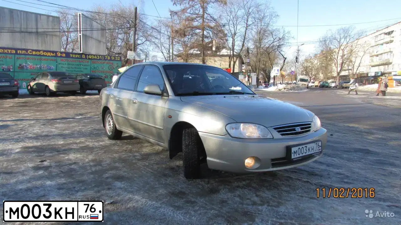 Фото автомобиля KIA SPECTRA, 2007 — госномер К738НВ45. Цвет: Золотисто-бежевый