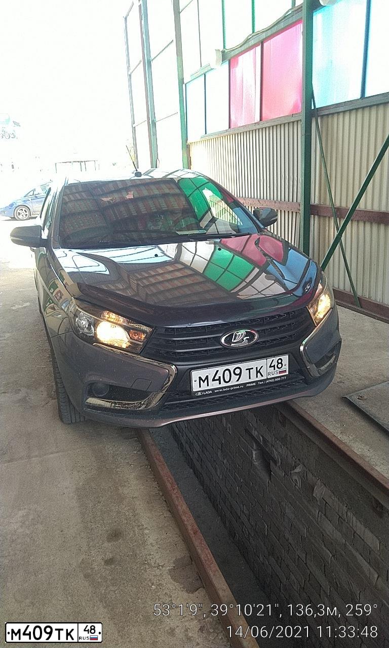 Фото автомобиля LADA VESTA, 2016 — госномер М409ТК48. Цвет: СЕРО-ГОЛУБОЙ