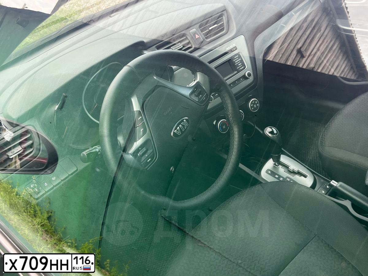 Фото автомобиля KIA RIO, 2016 — госномер Х709НН116. Цвет: ЧЕРНЫЙ