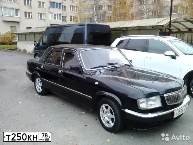 Фото автомобиля GAZ 3110 WOLGA, 2001 — госномер Р320АТ198. Цвет: ЧЕРНЫЙ