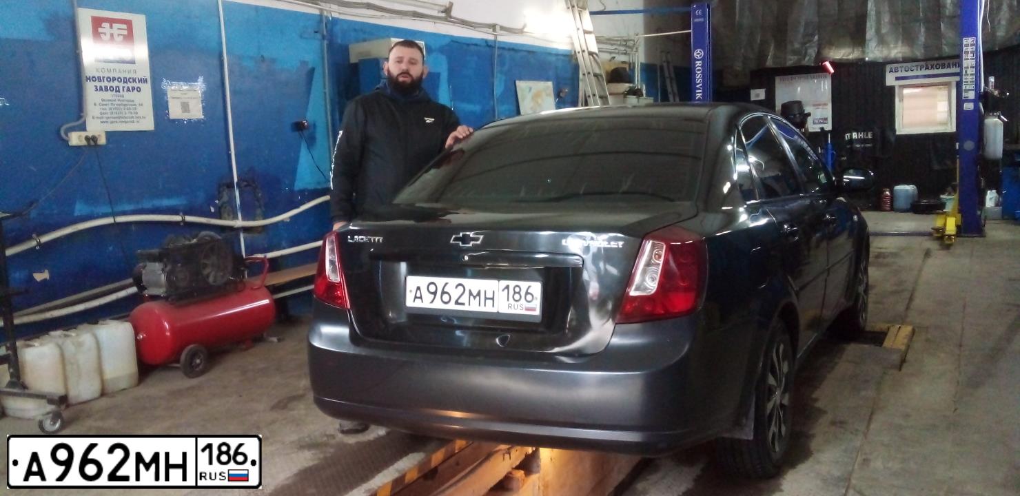 Фото автомобиля CHEVROLET LACETTI, 2007 — госномер Т162ВМ196. Цвет: ЧЕРНЫЙ