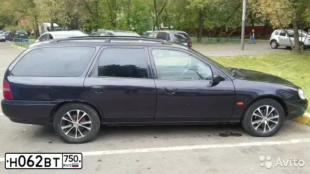 Фото автомобиля FORD MONDEO, 1998 — госномер Н062ВТ750. Цвет: ФИОЛЕТОВЫЙ