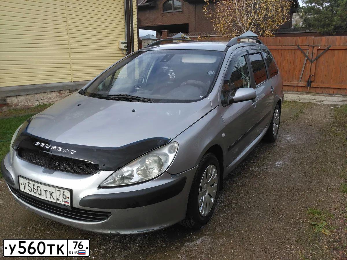 Фото автомобиля PEUGEOT 307, 2004 — госномер У560ТК76. Цвет: белый(серый)