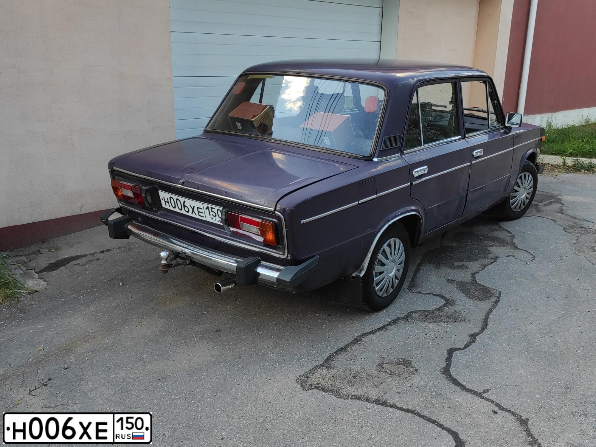 Фото автомобиля KAMAZ 55111 /6X4/, 1990 — госномер Н006ХЕ150. Цвет: Оранжевый
