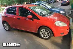 Фото автомобиля FIAT PUNTO, 2007 — госномер К281РЕ62. Цвет: Красный