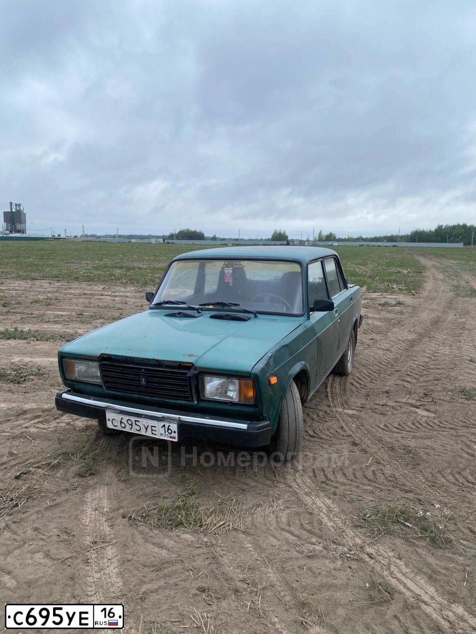 Фото автомобиля LADA 2107, 2004 — госномер С695УЕ16. Цвет: ЗЕЛЕНЫЙ