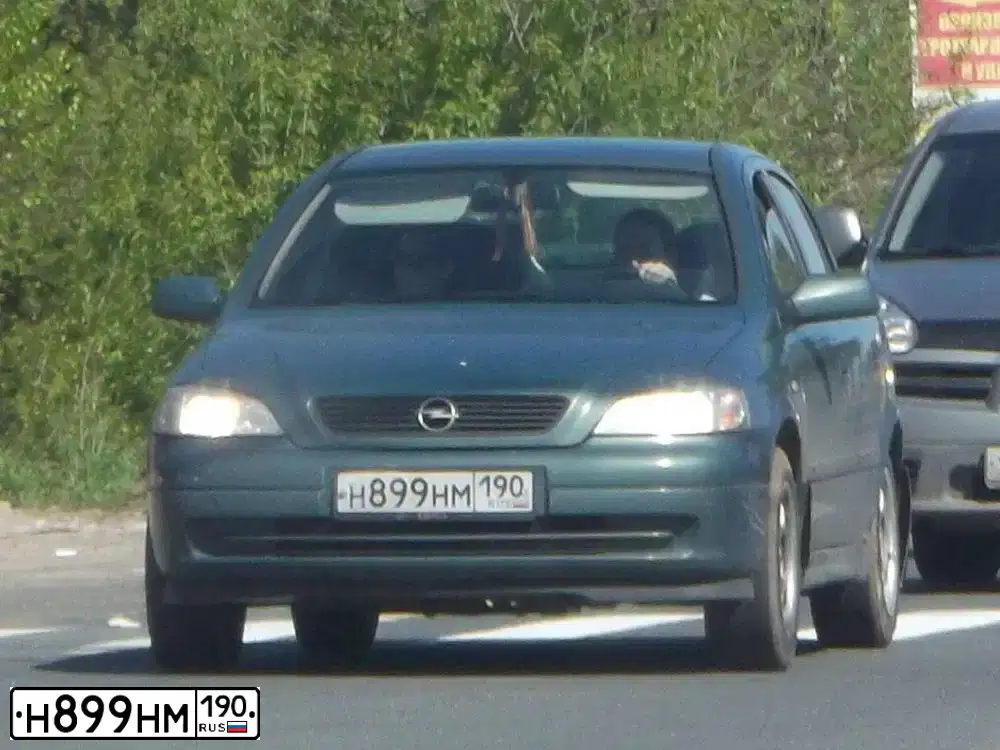 Фото автомобиля OPEL ASTRA, 2003 — госномер Н899НМ190. Цвет: ЗЕЛЕНЫЙ
